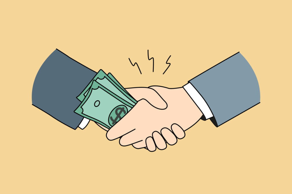 Handshake with money involved